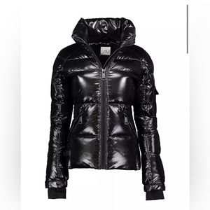 Sam’s Black Puffer Jacket